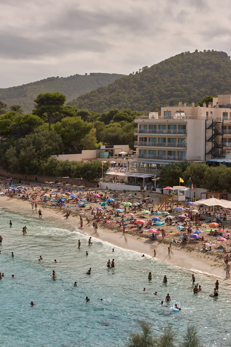 Crowded beach cove mallorca